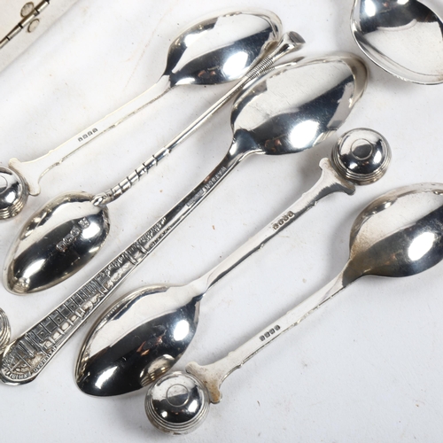 939 - A silver golfing spoon with club handle, a set of 6 silver plated spoons with bowling ball finials, ... 