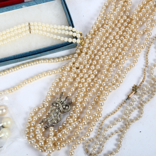 945 - A collection of various pearl necklaces, including a Japanese Kimura, a triple-strand necklace with ... 