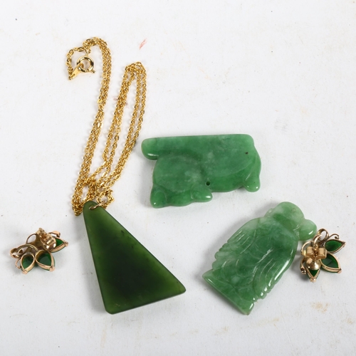 965 - 3 carved jade pendants, and a pair of unmarked gold jade earrings