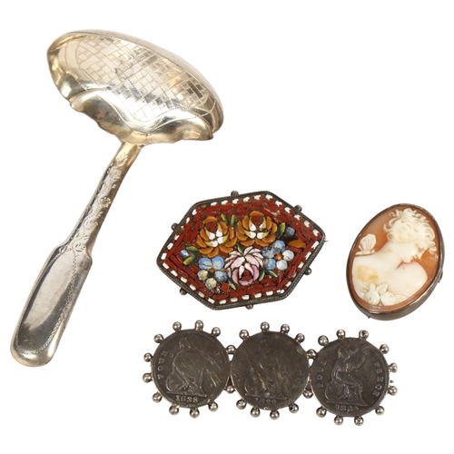 969 - A 19th century engraved silver caddy spoon, a relief carved cameo brooch in silver mount, a micro-mo... 