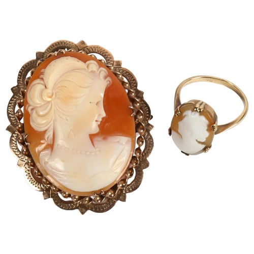 972 - A relief carved cameo brooch, set in a 9ct gold scrolled and pierced mount, and a 9ct gold child's r... 