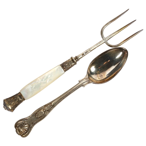 980 - A silver King's pattern design teaspoon, and a silver and mother-of-pearl handled bread fork, length... 