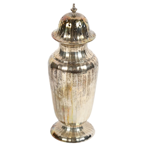 982 - An Edward VII silver sugar caster of stylised form, hallmarks Birmingham 1913, maker's marks William... 