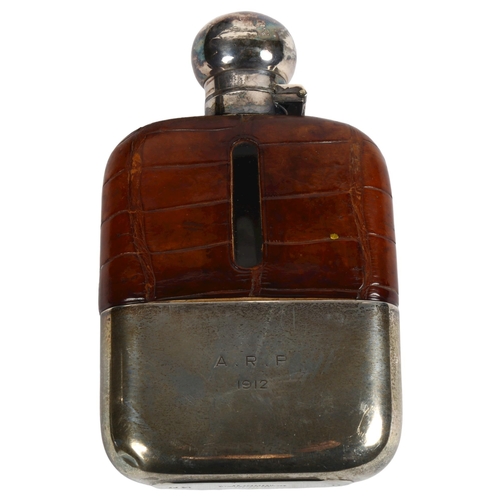 986 - A George V silver-mounted and half leather hip flask, with silver cup, hallmarks Birmingham 1935, ma... 