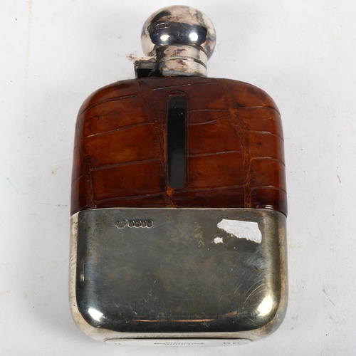 986 - A George V silver-mounted and half leather hip flask, with silver cup, hallmarks Birmingham 1935, ma... 