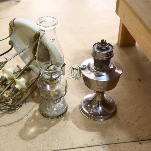 261 - A Vintage brass and painted metal hanging pendant light fitting, and 2 oil lamps