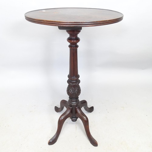 2717 - A Victorian mahogany circular topped wine table. 41cm x 72cm