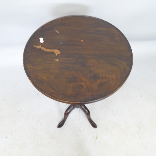 2717 - A Victorian mahogany circular topped wine table. 41cm x 72cm