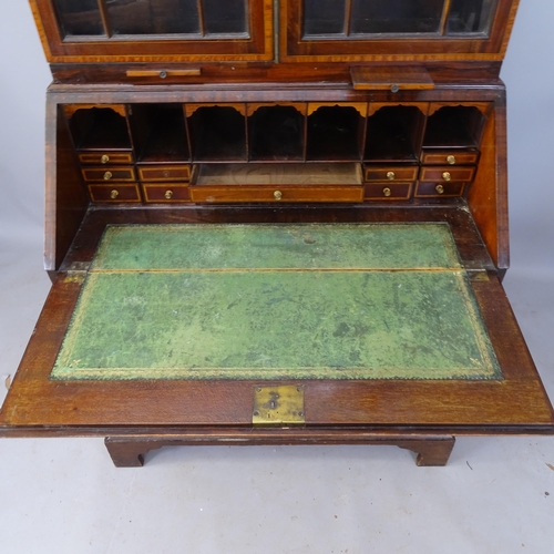 2357 - A 19th century crossbanded mahogany and satinwood-strung 2-section bureau bookcase, the fall-front r... 