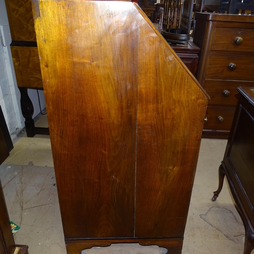 2045 - A 18th century oak 3-section bureau bookcase, the fall-front revealing a fitted interior with 4 long... 