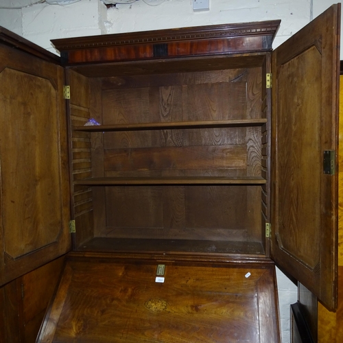 2045 - A 18th century oak 3-section bureau bookcase, the fall-front revealing a fitted interior with 4 long... 