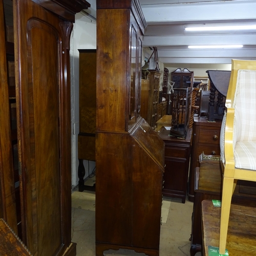 2045 - A 18th century oak 3-section bureau bookcase, the fall-front revealing a fitted interior with 4 long... 