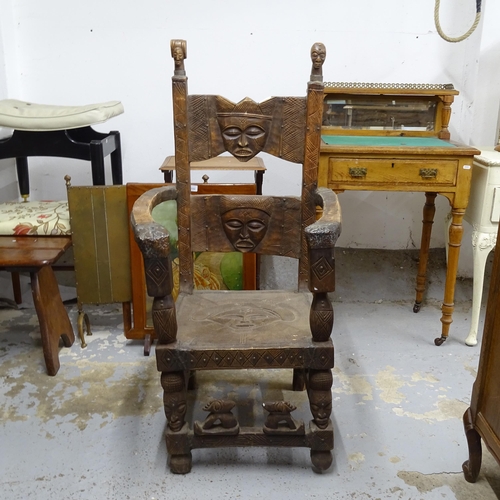 2705 - An early 20th century Chokwe African tribal Chieftain's chair, the figural carved wood with patinati... 