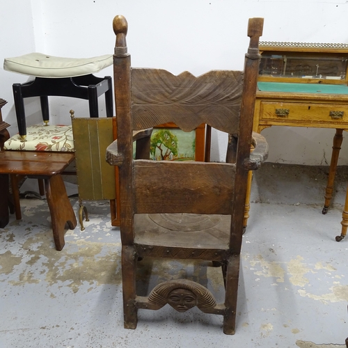 2705 - An early 20th century Chokwe African tribal Chieftain's chair, the figural carved wood with patinati... 