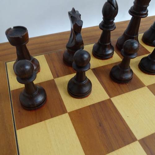 566 - A modern turned wood chess set, complete with 32 pieces and chess board, King height 11cm