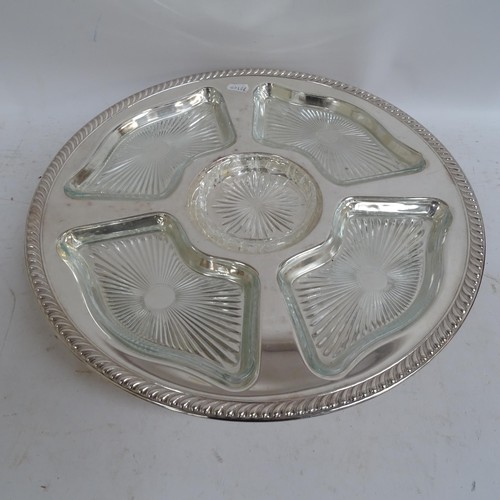 938 - A pair of silver plated lazy Susan's, with fitted glass dishes