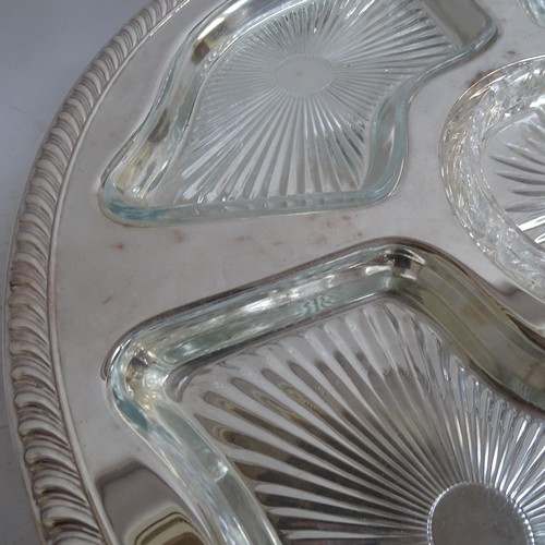 938 - A pair of silver plated lazy Susan's, with fitted glass dishes