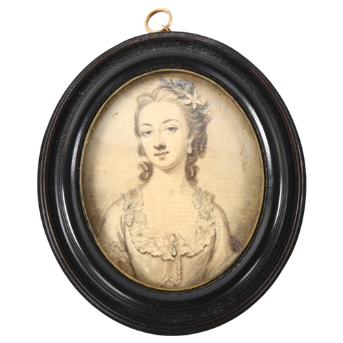 100 - An 18th century miniature watercolour on paper, half length portrait of a lady, unsigned in moulded ... 