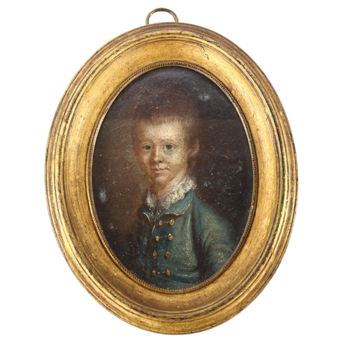 101 - An 18th century miniature oil on board, portrait of a child wearing a blue coat, inscribed verso Joh... 