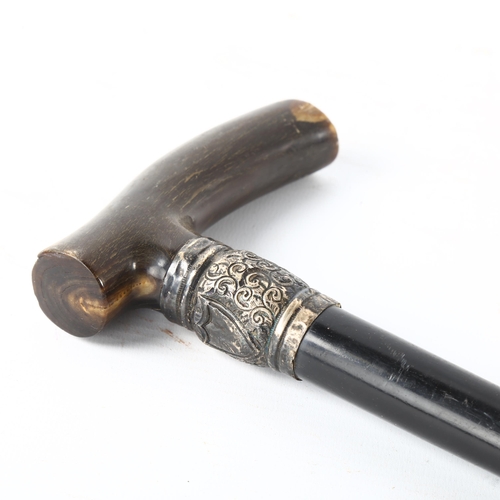 115 - A Victorian horn-handled walking stick, with unmarked embossed silver collar