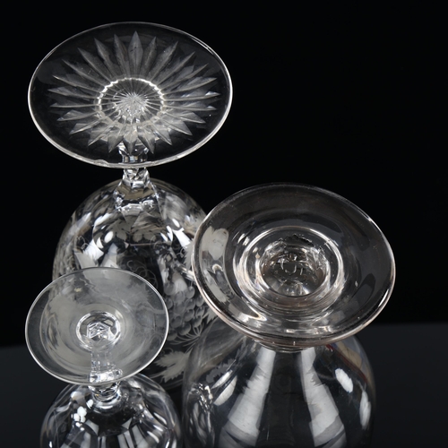 13 - A 19th century wine glass with engraved grapevine bowl, height 17cm, and 2 other Antique glasses (3)