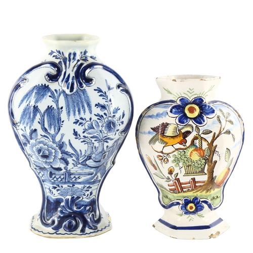 137 - An 18th century Delft blue and white pottery vase, height 27cm, and a tin glazed faience pottery vas... 