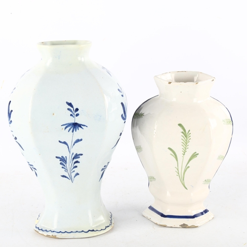 137 - An 18th century Delft blue and white pottery vase, height 27cm, and a tin glazed faience pottery vas... 