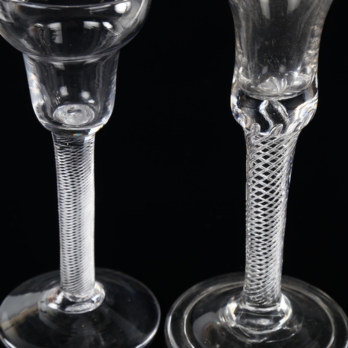 14 - 2 Antique cordial glasses with opaque multi air twist stems, height 16.5cm and 14cm (2)