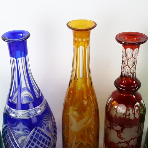 21 - A group of 5 x 19th century coloured glass decanters, largest height 39cm (5)