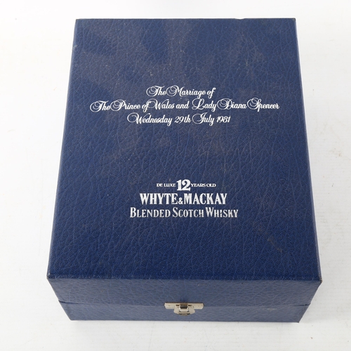 24 - a bottle Whyte & Mackay 12 year old whisky, bottled for 1981 Royal Wedding , in presentation box.