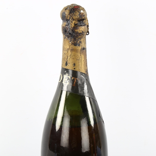 31 - A bottle of Moet & Chandon 1914 Dry Imperial Champagne