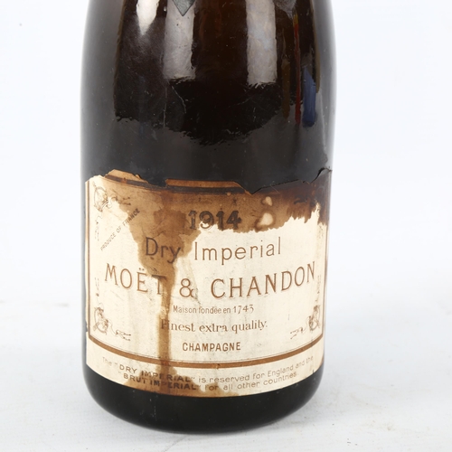 31 - A bottle of Moet & Chandon 1914 Dry Imperial Champagne