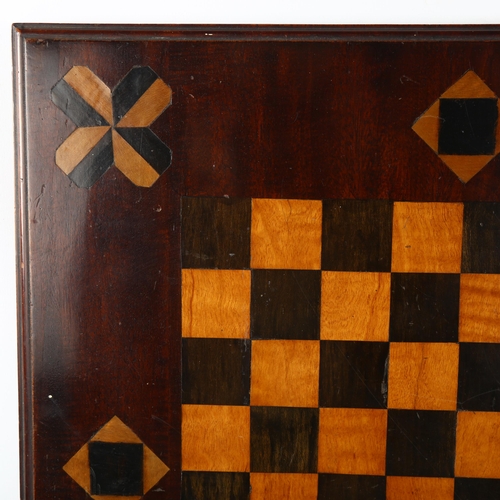38 - A 19th century parquetry inlaid mahogany games board, 46cm x 46cm