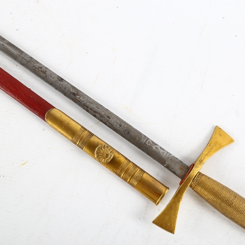 58 - A masonic ceremonial sword by Spencer & Co, London, etched decoration to blade, in red leather sheat... 
