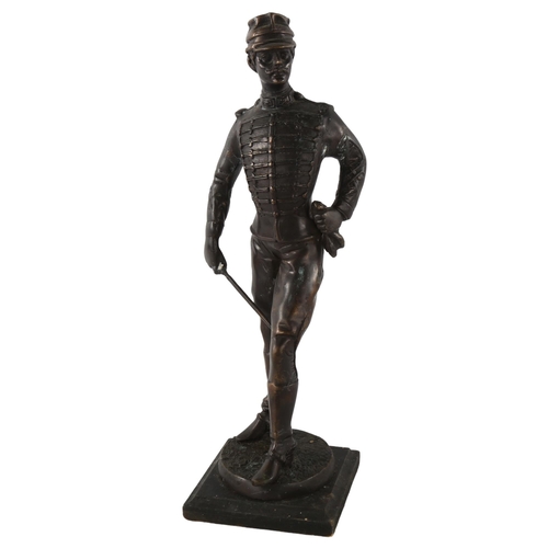 79 - A patinated bronze military figure, unsigned, height 38cm