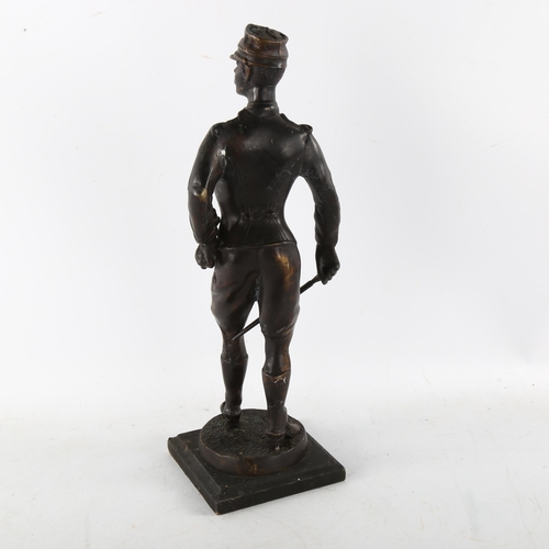 79 - A patinated bronze military figure, unsigned, height 38cm