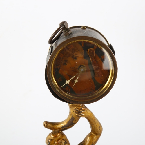 83 - A 19th century novelty clock, supported by gilt-metal figure, height 27cm