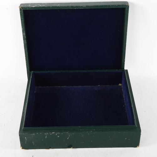 89 - A green leather-bound jewel box, with floral enamel inset panel, 22cm x 19cm