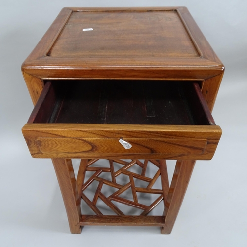 2006 - A Chinese elm square topped 2-tier jardiniere stand with single frieze drawer and geometric design l... 