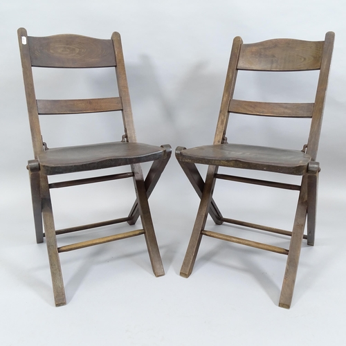 2010 - A pair of antique mahogany folding chairs