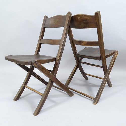 2010 - A pair of antique mahogany folding chairs