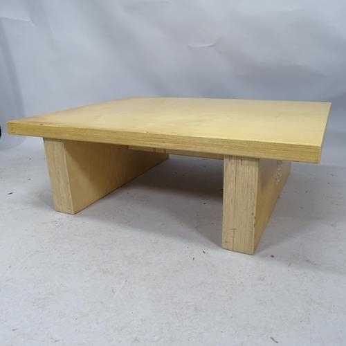 2021 - A contemporary craftsman made knock down coffee table in laminated birch with prominent maker's logo... 