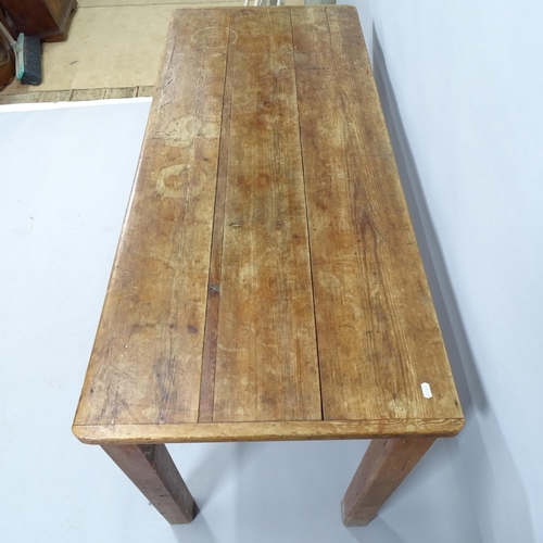 2024 - An antique pine plank top kitchen table. 146x74x60cm.