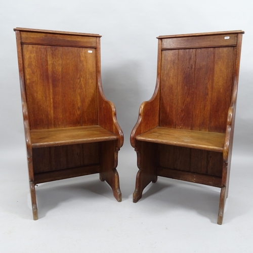 2027 - A pair of stained oak Gothic church seats. 52x100x46cm.