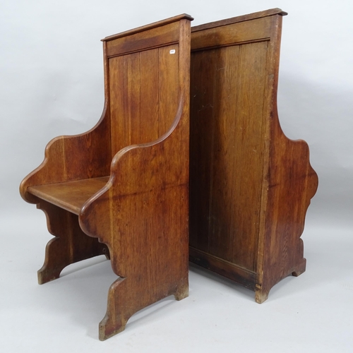 2027 - A pair of stained oak Gothic church seats. 52x100x46cm.