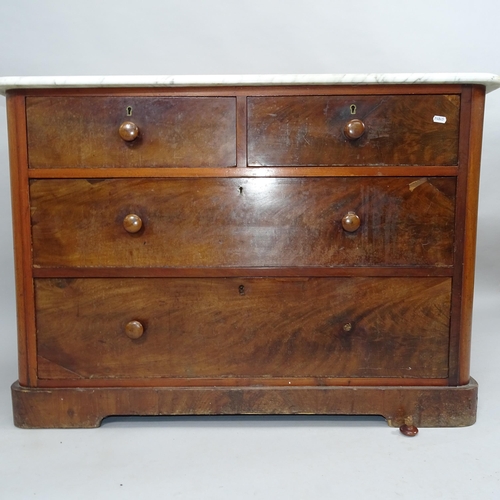 2029 - A Victorian mahogany marble topped chest of two short and two long drawers. 105x73x55cm