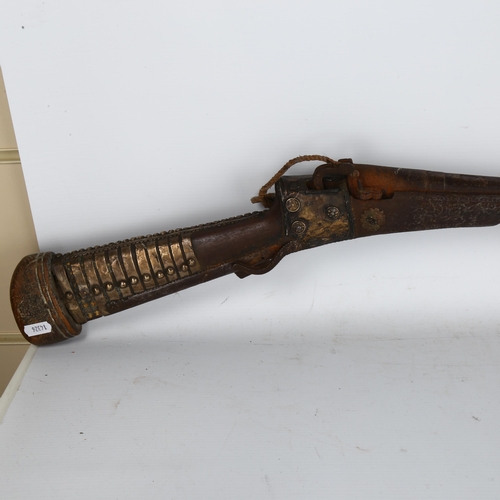 164 - A 19th century Indian Taradar matchlock rifle, length 142cm