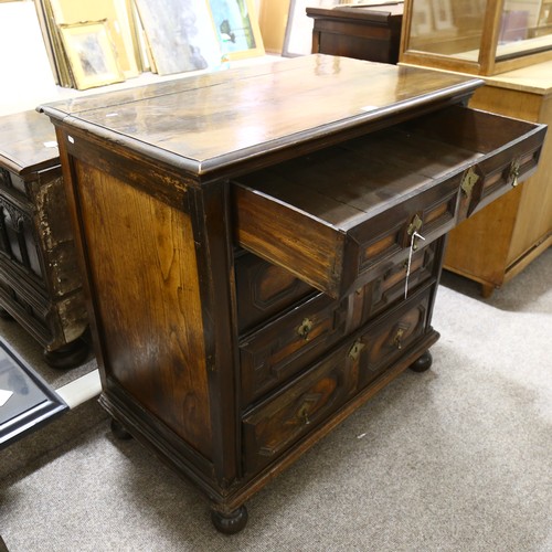 160 - A Jacobean oak chest of 4 long drawers on bun feet. 100 x 100 x 59cm.