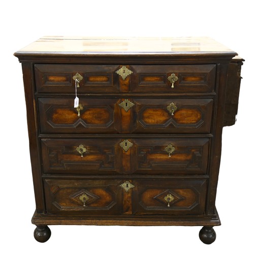 160 - A Jacobean oak chest of 4 long drawers on bun feet. 100 x 100 x 59cm.