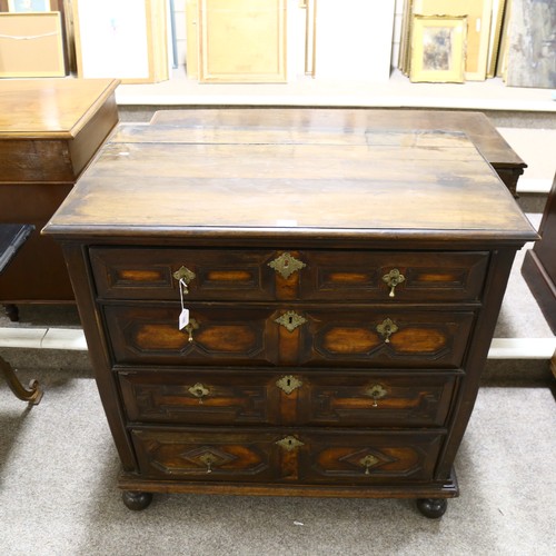 160 - A Jacobean oak chest of 4 long drawers on bun feet. 100 x 100 x 59cm.